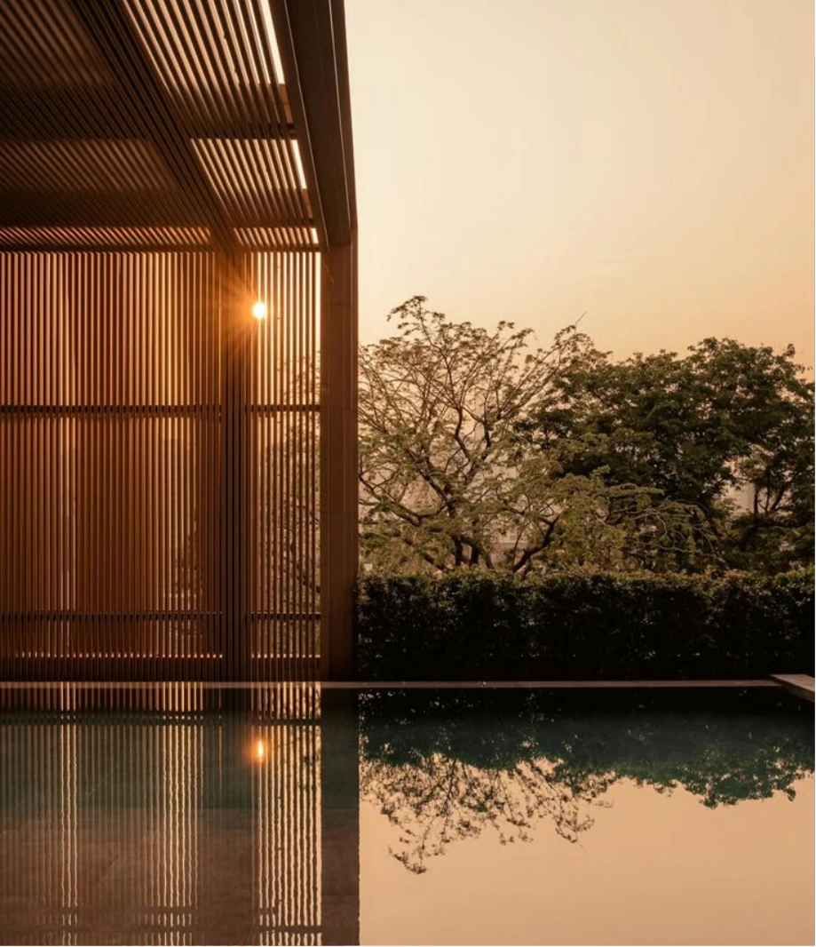 Vanam Villas pool opening onto the Goan landscape at sunset