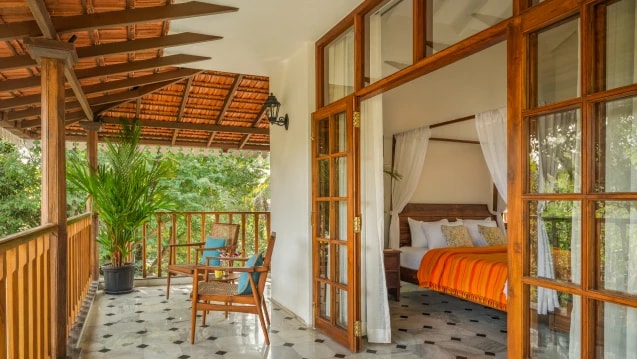 Villa Perola interior connected to the surrounding Goan garden